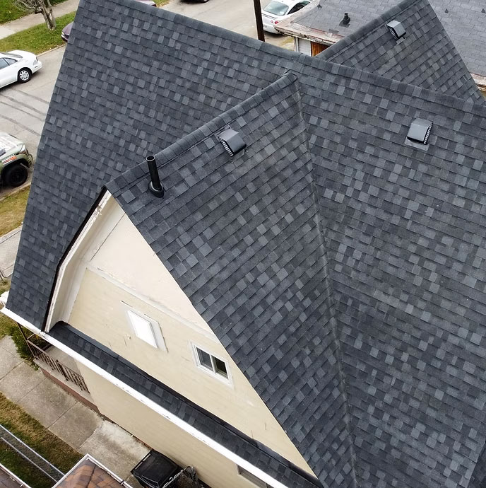 Aerial of shingle valleys and roof vents on a finished job